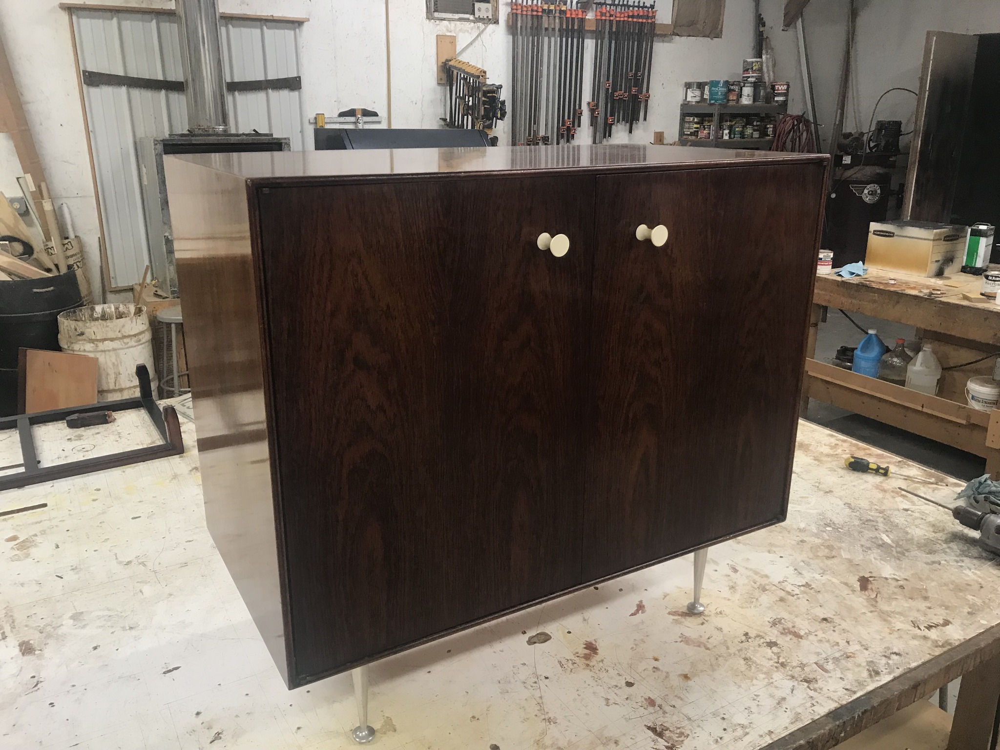 George Nelson Thin Edge cabinet before refinishing - crazing lacquer and darkened rosewood veneer